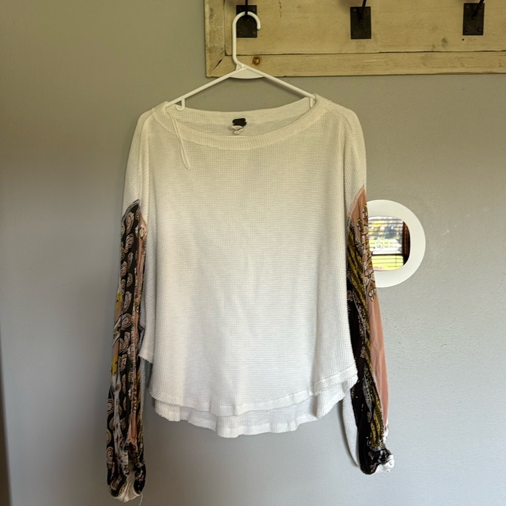 Free people shirt. Beautiful patterned silk sleeves. A must have